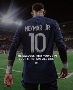 a man in a soccer uniform with the words neymar jr on his back