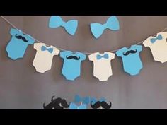 blue and white baby shower decorations with mustaches