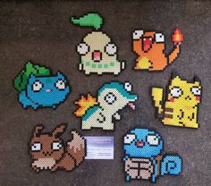 some pixel art pieces are on the floor