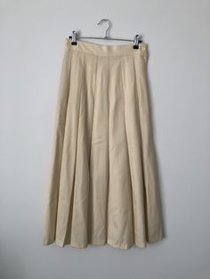 Beautiful 1940's/1950's vintage cream/beige A line skirt. Gorgeous fitted waist, flaring with pleats. Zip and button closure 100% PURE WOOL Some small moth holes, but otherwise beautiful vintage condition. DECHAMPS international, size AU10 Classic Beige Flared Skirt, Blanche Dubois, 1940s Clothing, 1940s Outfits, Small Moths, Beige Skirt, Pedal Pushers, Pinafore Dress, Line Skirt