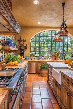 a kitchen with an arched window and tile flooring, along with wooden cabinets and counter tops