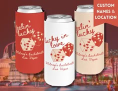 three can coolers with custom names and locations on them, one is red the other is white