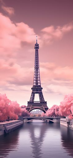 the eiffel tower is surrounded by pink trees and water in front of it