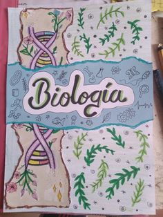 a notebook with the word biologia written on it