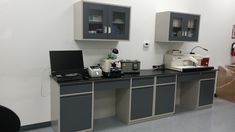 a lab area with two computers on the desk