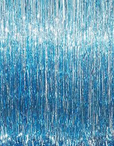 blue tinsel rain shower curtain hanging from the ceiling