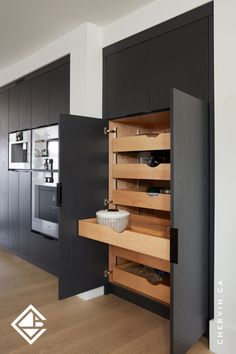 A tall pantry cabinet in a kitchen with roll out drawers. U Shape Pantry, Kitchen Cabinet Layouts, Pantry Pull Out Drawers, Galley Kitchen Cabinets, U Shaped Kitchen Cabinets, Galley Kitchen Ideas, Cabinet Layout, Pantry Inspiration, Galley Kitchen Design