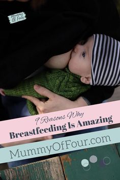 a woman holding a baby in her arms with the words breastfeeding is amazing