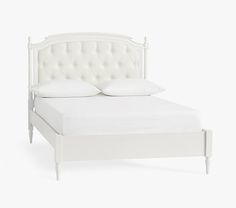 a white bed with an upholstered headboard and foot board measurements for the frame