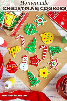 homemade christmas cookies are displayed on a table