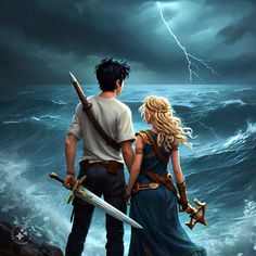 a man and woman standing next to each other in front of the ocean with swords