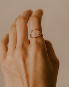 Open Circle Ring Our Open Circle Ring is perfect for everyday wear, with a hammered texture on the band. Made in 14k Gold Fill or Sterling Silver from sizes 5-16. Half Sizes are available. Minimal Rings Gold, Open Circle Ring, Hand Poses, Open Ring Gold, Minimalistic Jewelry, Gold Minimalist Jewelry, Open Heart Ring, Gold Stacking Ring, Hand Rings