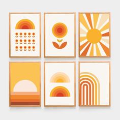 four orange and yellow art prints on a white wall, with the sun in the background