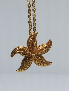 Starfish necklace. 30 inch chain Starfish Necklace, Starfish, Vintage Gold, Pendant Necklaces, Jewelry Necklace Pendant, Gold Tones, Jewelry Necklaces, Necklaces, Ships