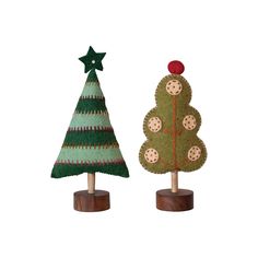 two small wooden christmas trees sitting on top of each other