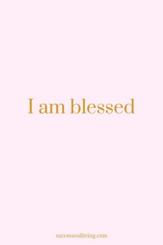 the words i am blessed are in gold on a pink background