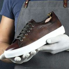 Note: This Limited Edition shoes will be exclusively crafted for YOU and are not made in advance. Please allow 3-6 weeks for delivery. Astonishing pair of trainer sneakers are made of our braided pattern embossed crust calf leather. The leather is hand painted and finished by our artisans with the fire museum patina, an astonishing combination of brushing and sponge painting techniques that includes shades of brown, red and yellow. The pair features brown shoelaces, brown inner lining, and the s Braided Pattern, Fire Orange, Sponge Painting, Gentleman Shoes, Custom Made Shoes, Braid Patterns, Limited Edition Shoes, Limited Edition Sneakers, Shoe Tree