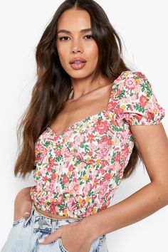 Womens Floral Ruched Front Crop Top - White - 10 - Say it with flowers this season with this floral top from our latest collection. A feminine option that's perfect for spring, summer and beyond, this style is the perfect addition to your new-season closet. Got plans? Pair a ditsy floral top with your fave jeans and sneakers for a weekend-ready look that's super cute and on-trend. If you're heading out for drinks, a floral blouse teamed with floaty wide-leg pants is a guaranteed winner.Style: Cr White Blouse Designs, Floral Top Outfit, Crop Top With Puff Sleeves, Say It With Flowers, Ditsy Floral Top, Top With Puff Sleeves, Front Crop Top, Floral Crop Tops, Spring Tops