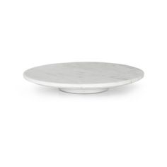 a white marble plate on a white background