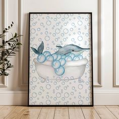 a painting of two dolphins in a bathtub with bubbles on the wall next to a potted plant