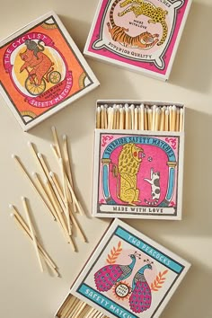 four matches are lined up on a table