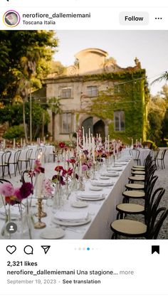 an image of a table set up with flowers and place settings on it for a wedding