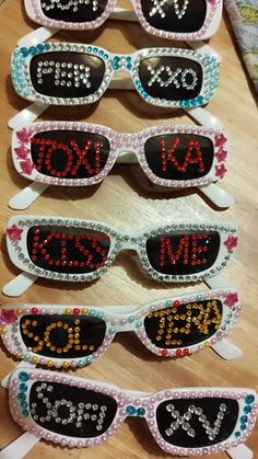 six pairs of sunglasses with the word monogrammed on them, all decorated in different colors