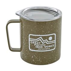 a brown and white coffee mug with the words great pacific iron works on it's side