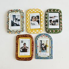 four different colored frames with pictures on them