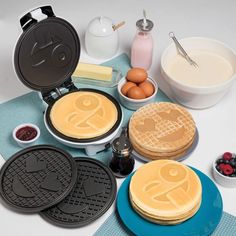 some pancakes and other food items on a table