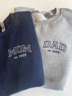 This is the perfect gift to announce your new baby! Or even better to remind yourselves of the year when craziest/best journey of being a parent started!  This sweatshirt or hoodie is perfect for wearing out on a weekend date with mom, dad and the most importantly, the new baby! Items ship in 1 week or less from when the order is placed.  3 Simple Steps to get your next favorite item! 1) Select your size of hoodie or sweatshirt 2) Select the color you would like it in 3) Submit your personalization          3A) Est. Year          3B) Thread color! All Sales are final. No returns or exchanges. Please make sure to check sizing chart before ordering. Mom And Dad Coming Home Shirts, Custom Mom Gifts, Cool Mom Sweatshirt, Family Matching Sweatshirt With Letter Print As Gift, Family Matching Letter Print Sweatshirt As Gift, Family Matching Sweatshirt With Letter Print, Personalized Cotton Sweatshirt As A Gift, Personalized Cotton Sweatshirt As Gift, Personalized Cotton Sweatshirt For Family