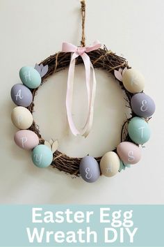 an easter egg wreath hanging on the wall