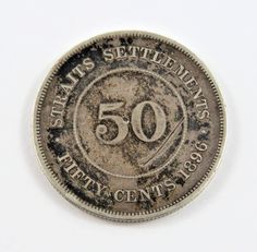 an old 50 cents coin with the number fifty on it