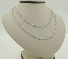 Vintage handmade 14K white gold natural white topaz necklace.  This stunning necklace is 30 inch long and has 53 natural white topaz. Each stone weighs 0.35 ct. and is 10mm spaced on a cable chain. Total topaz weight: 18.5 ct. Chain thickness: 0.95mm Total necklace weight: 10.4g Hallmarks: 14K Will be placed into a suitable gift box Free shipping within the U.S. Larchmont Ny, White Topaz Necklace, Topaz Necklace, Wedding Jewellery Necklace, Stunning Necklace, White Topaz, Wedding Necklace, Cable Chain, Wedding Jewelry