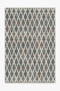 a rug with an abstract design on the front and back of it in grey, white and