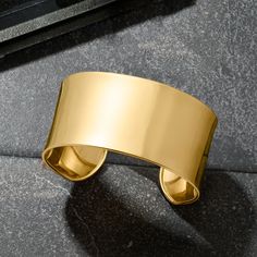 Ross-Simons - Italian 14kt Yellow Gold Wide Cuff Bracelet. 8". A minimalist design. A substantial silhouette. A phenomenal shine. This 1 1/8" cuff bracelet was crafted in Italy from brightly polished 14kt yellow gold. Flexible fit. Slip-on, 14kt yellow gold cuff bracelet. Modern Gold Open Cuff Jewelry, Elegant Open Cuff Bangle With Polished Finish, Elegant Open Band Bangle For Formal Occasions, Elegant Open Band Formal Bangle, Elegant Formal Open Band Bangle, Modern Yellow Gold Wide Band Bracelet, Modern Yellow Gold Cuff Bracelet With Shiny Finish, Modern Shiny Yellow Gold Cuff Bracelet, Gold Modern Cuff Bracelet For Formal Occasions