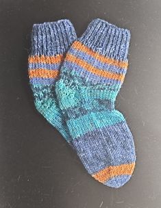 Hand knitted socks Size: 22/23 Material composition: 75% virgin wool 25% polyamide Care instructions: Washable at 40o Celsius Not suitable for dryers Do not use fabric softener These hand-knitted socks in size 22/23 are made from a high-quality blend of virgin wool and polyamide. They offer the perfect combination of warmth, comfort and durability. The virgin wool provides natural warmth and breathability, while the polyamide content makes the socks robust and durable. Please follow the care ins Hand Knit Socks, Knitted Socks, Dryers, Socks And Hosiery, Fabric Softener, Knitting Socks, Hosiery, Tumble Dryer, Hand Knitting