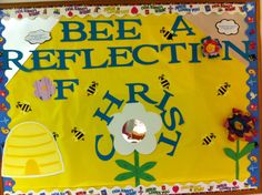 a bulletin board with bees and flowers on it