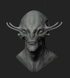 an alien head is shown with horns on it