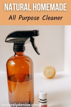 an all purpose cleaner bottle next to a lemon slice with the text homemade natural all purpose cleaner