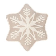 a white snowflake shaped rug on a white background with an off - white border