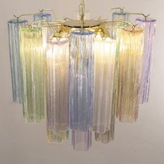 a multicolored chandelier hanging from a ceiling