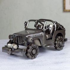 a toy car made out of metal parts