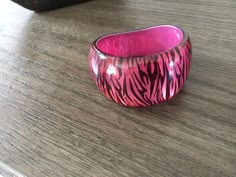 VINTAGE  bangle bracelet measures approximately three inches wide.   In beautiful condition. Date:  Not sure CONDITION: very   Good condition  PAYMENT:  Direct checkout  FROM A SMOKE-FREE HOME! PLEASE CHECK OUT MY OTHER items  WE HAVE MANY TO CHOOSE FROM - AND WE WILL GLADLY COMBINE ORDERS TO SAVE YOU MONEY  . Thanks for looking. Mcbling Bracelet, Pink Bangles Aesthetic, Cheap Funky Pink Bracelets, Y2k Bangles, Mcbling Accessory, Paw Print Bracelet, Trashy Outfits, Modern Mugs, Vintage Betsey Johnson