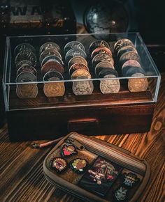 ✅ SHOWCASE & PROTECT YOUR COLLECTION: This eye-catching challenge coin display stand offers a polished presentation and safeguards each unique coin from scratches, dust, and wear, preserving their significance for years to come. 💎 INNOVATIVE STORAGE WITH VISIBLE PROTECTION: Each challenge coin holder includes a clear acrylic cover for full visibility and protection, plus a bottom drawer with a removable insert to customize your storage space. 🪵 HANDCRAFTED FROM PREMIUM WOOD: Made from high-quality paulownia wood, this military coin holder features precisely carved grooves to fit coins up to 2.2" in diameter--perfect for military challenge coins, commemorative medallions, and tokens from significant events. 😍 AVAILABLE IN TWO SIZES TO SUIT YOUR COLLECTION: Choose from our larger case, fi Coin Storage Ideas, Coin Collection Display, Coin Holder Military, Coin Display Stand, Challenge Coin Holder, Military Challenge Coins, Military Coins, Challenge Coin Display, Paulownia Wood