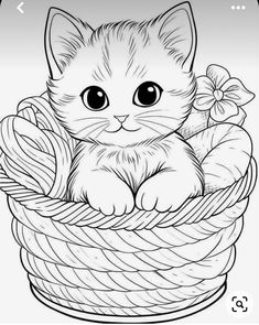 a kitten sitting in a basket with flowers on the bottom and one paw resting on it's head