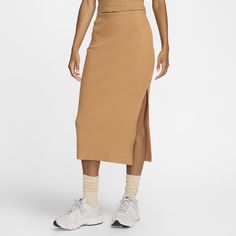 Grounded in style, comfort and versatility, meet our take on luxury loungewear. A slim fit and elastic waistband give this ribbed skirt a snug feel, making it perfect for those low-key days when you want to feel comfy while still looking put together. Chic Ribbed Long Skirt, Ribbed Stretch Midi Skirt, Long Relaxed Ribbed Skirt, Solid Color Ribbed Midi Skirt, Non-stretch Mid-rise Medium Wash Skirt, Rib Skirt, Looking Put Together, Luxury Loungewear, Ribbed Skirt