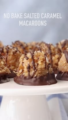 no bake salted caramel macaroons on a white plate with chocolate drizzle