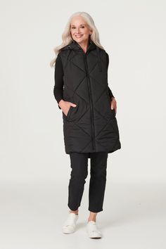 Add a transitional layer to your closet with this versatile and stylish puffer vest. It has a hood, a zip front closure, handy pockets, a sleeveless fit and a sleek longline silhouette dropping to thigh length. Perfect for adding some extra warmth to an outfit. Pair with trainers for a chic off-duty style. Puffer Gilet, Petite Jumpsuit, Petite Coat, Plus Size Coats, Tall Clothing, Stunning Outfits, Tshirt Skirt, Petite Outfits, Women's Coats & Jackets