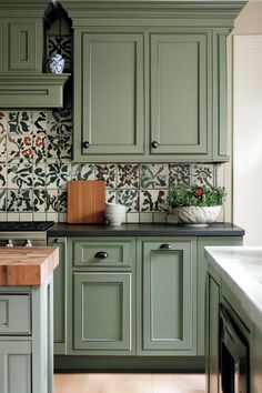 13 Sage Green Cabinet Designs You’ll Love - DreamyHomeStyle Countertops With Sage Green Cabinets, Grey And Green Kitchen Ideas, Kitchen Sage Green Cabinets, White Cabinets Green Backsplash, Sage Green Kitchen Cabinets Farmhouse, Clary Sage Kitchen Cabinets, Sage Green Cabinets Kitchen, Sage Green Cabinet, 2 Toned Kitchen Cabinets